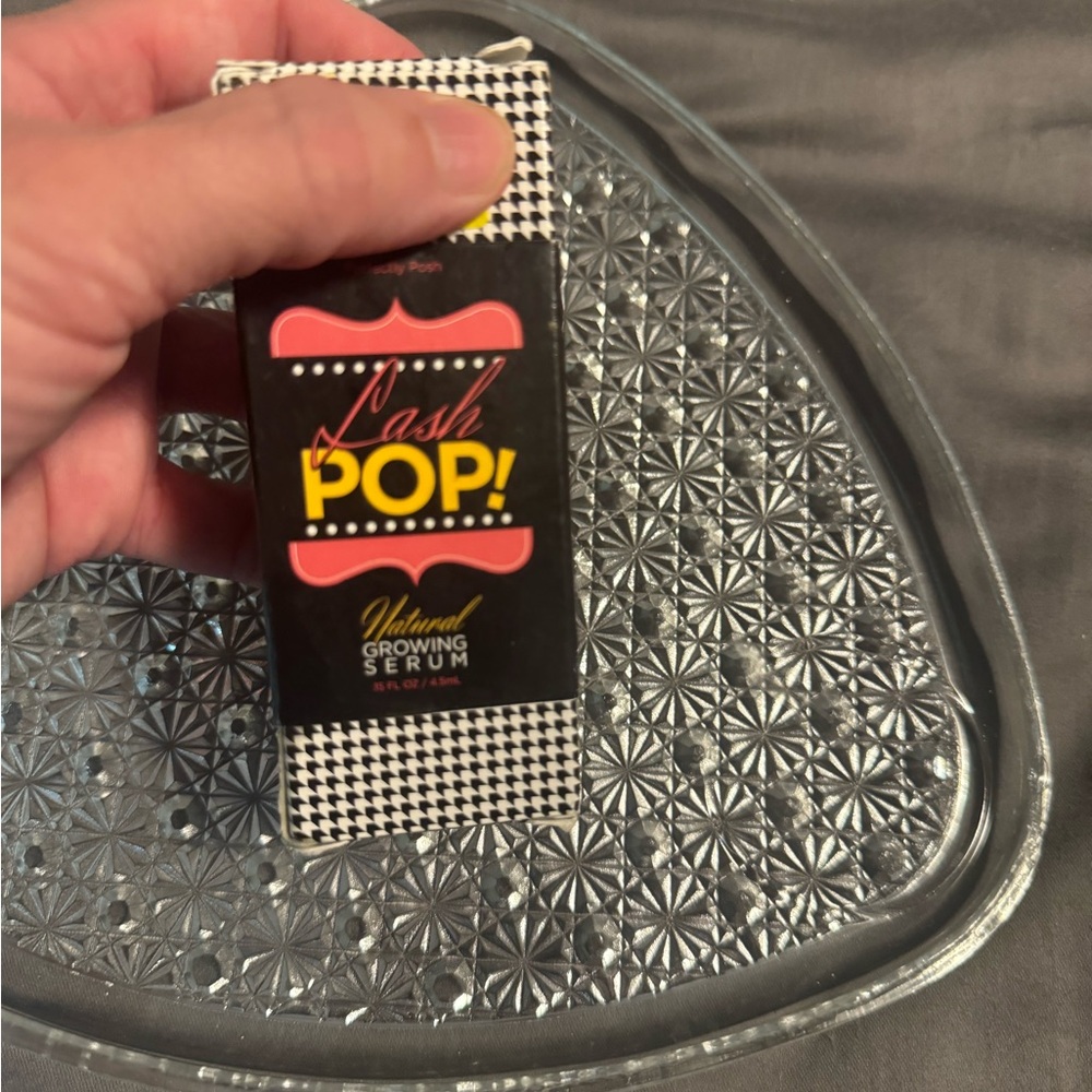 Perfectly Posh Lash Serum in Black and White Packaging